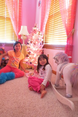 Karis (and Kasen) with her Christmas tree